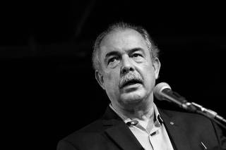 Brazilian politician Aloizio Mercadante attends a news conference at the transition government building in Brasilia