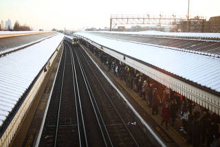 Morning rush hour at Clapham Junction station during a heavily reduced railway service amid an ongoing rail worker strike in London