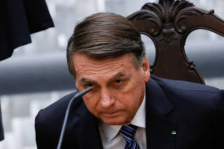 Brazil's President Jair Bolsonaro attends an inauguration ceremony for new judges of Brazil's Superior Court of Justice in Brasilia
