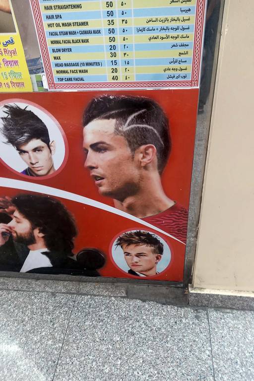 Nas centenas de salões de cabeleireiros para homens de Doha, a capital do Qatar, os modelos expostos nas paredes são os craques da bola Lionel Messi, Neymar e Cristiano Ronaldo
