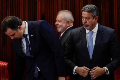Rodrigo Pacheco, President of the Brazil's Federal Senate, and Arthur Lira, President of the Brazil's Chamber of Deputies, stand as Brazilian President-elect Luiz Inacio Lula da Silva attends a ceremony to receive the confirmation of his victory in the recent presidential election, in Brasilia, Brazil December 12, 2022. REUTERS/Ueslei Marcelino