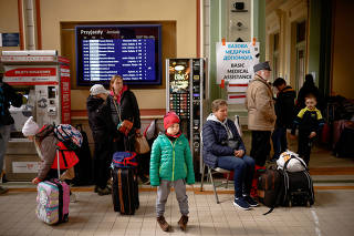 FILE PHOTO: People flee from Russia's invasion of Ukraine, in Przemysl