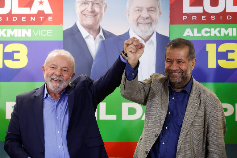 Presidente eleito Luiz Inácio Lula da Silva e presidente do PDT, Carlos Lupi,