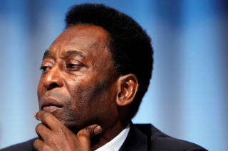 FILE PHOTO: Pele attends a news conference after the Rio de Janeiro bid committee presented the city of Rio de Janeiro's candidature for the 2016 Olympic Games in Copenhagen
