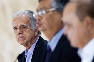 Brazilian defense minister nominee Jose Mucio Monteiro,  Brazilian justice minister nominee Flavio Dino and Brasilia's Governor Ibaneis Rocha attend a news conference at the headquarters of the Government of the Federal District in Brasilia
