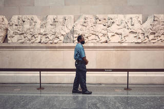 A security guard at the Parthenon gallery at the British Museum in London, on Aug. 27, 2020. (Tom Jamieson/The New York Times)