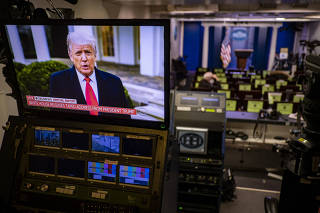 President Donald Trump's taped message is seen on a monitor in the White House Press Briefing Room as he addresses actions by his supporters at the Capitol building in Washington, Jan. 6, 2021. (Pete Marovich/The New York Times)