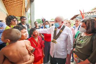 FILE PHOTO: Brazil's President Luiz Inacio Lula da Silva looks on, as he visits the Yanomami Indigenous Health House (CASA Yanomami) in Boa Vista