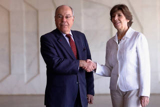 Brazil's Foreign Minister Mauro Vieira greets French Foreign Minister Catherine Colonna before a meeting at Itamaraty Palace in Brasilia