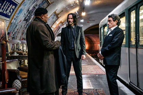 Laurence Fishburne as Bowery King, Keanu Reeves as John Wick, and Ian McShane as Winston in John Wick 4. Photo Credit: Murray Close