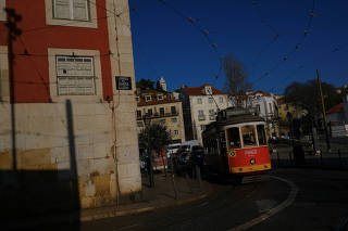 A tram is seen in Alfama neighbourhood in Lisbon