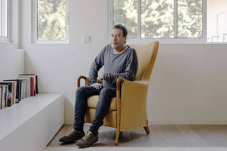 Yanki Margalit, a veteran entrepreneur, at his home in Ramat Gan, Israel on Feb. 19, 2023. (Ofir Berman/The New York Times)