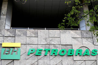 FILE PHOTO: A logo of Brazil's Petrobras oil company is seen at their headquarters in Rio de Janeiro