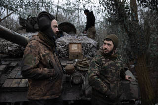 Ukraine?s 72nd brigade tank crew stores their vehicle near the front line, in the Donetsk region of Ukraine on Feb. 25, 2023.  (Tyler Hicks/The New York Times)