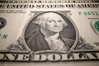 FILE PHOTO: A U.S. Dollar banknote is seen in this illustration taken May 26, 2020.