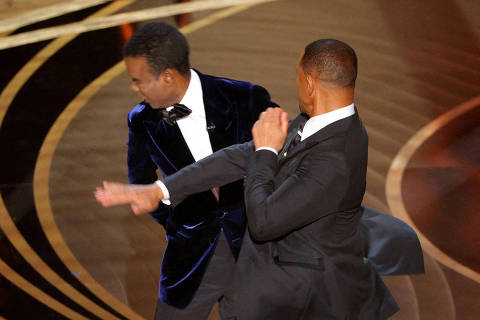 FILE PHOTO: Will Smith hits Chris Rock onstage during the 94th Academy Awards in Hollywood, Los Angeles, California, U.S., March 27, 2022.        REUTERS/Brian Snyder/File Photo ORG XMIT: FW1