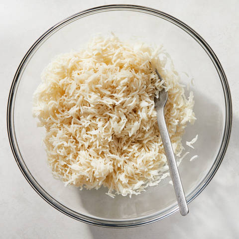 Microwave rice in New York, Feb. 16, 2023. It may seem like sacrilege to stovetop loyalists, but when it comes to consistency, a microwave is a weeknight mealÕs best friend. Food styled by Barrett Washburne. (Julia Gartland/The New York Times) ORG XMIT: XNYT53