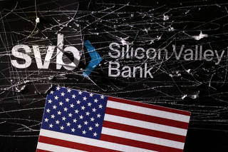 FILE PHOTO: Illustration shows destroyed SVB (Silicon Valley Bank) logo and U.S. flag