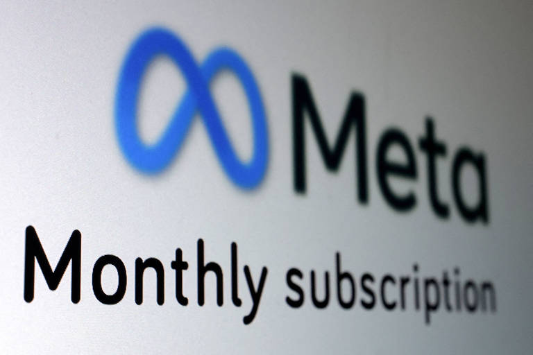 Logo da rede social Meta sobre as palavras "monthly subscription" (assinatura mensal, em português)
