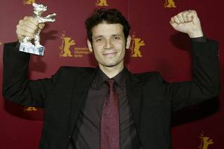 ARGENTINE DIRECTOR DANIEL BURMAN POSES WITH HIS SILVER BEAR AT BERLINALE FILMFESTIVAL IN BERLIN