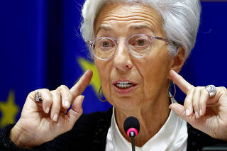 FILE PHOTO: European Central Bank President Lagarde testifies before the EU Parliament's Economic and Monetary Affairs Committee in Brussels