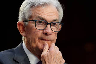 FILE PHOTO: Federal Reserve Chair Jerome Powell testifies at a hearing on Capitol Hill in Washington