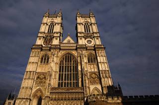Afternoon sun illuminates Westminster Abbey in London