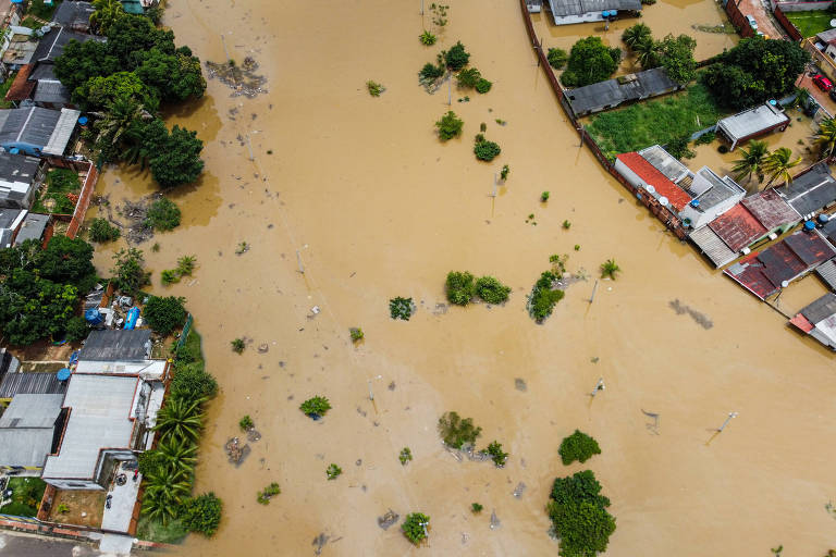 Área residencial alagada após as fortes chuvas que atingiram Rio Branco (AC) na última sexta (24)
