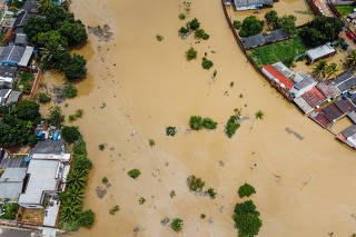 A flooded residential area is seen after heavy rains in Rio Branco