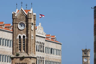 Clock towers are pictured near the government palace in Beirut