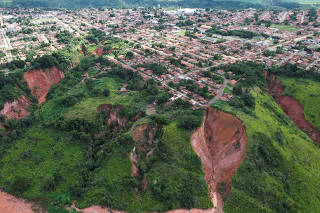An aerial view shows holes created by landslides in past years and increased due recent heavy rains, in Buriticupu