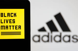 Illustration shows Adidas and Black Lives Matter logos