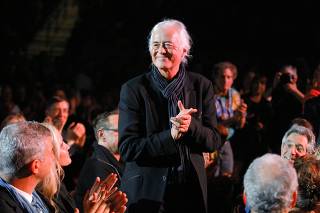 File photo of Guitarist Jimmy Page of the band Led Zeppelin being introduced during the Berklee College of Music Commencement Concert in Boston