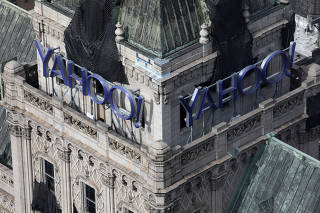 The Yahoo! company logo appears on the old New York Times building in New York City