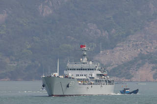 A Chinese warship sails during a military drill near Fuzhou, Fujian Province, near the Taiwan-controlled Matsu Islands