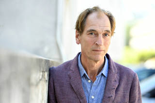 FILE PHOTO: Actor Julian Sands poses before an interview at the 76th Venice Film Festival