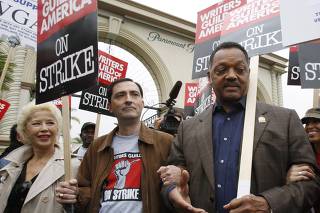 Rev. Jesse Jackson joins Writers Guild of America President Verrone on a picket line in Los Angeles