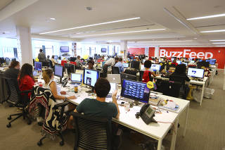 Buzzfeed employees at the company's headquarters in New York, Aug. 7, 2014. (Chang W. Lee/The New York Times)
