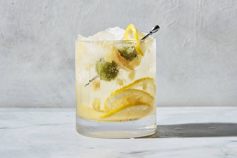 A nonalcoholic dirty lemon tonic in New York, March 29, 2023. A savory, bright blend of preserved and fresh lemon with dry tonic water makes a refreshing nonalcoholic drink. Food styled by Simon Andrews. (Christopher Testani/The New York Times)