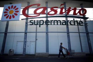 FILE PHOTO: A logo of French retailer Casino is pictured outside a Casino supermarket in Nantes