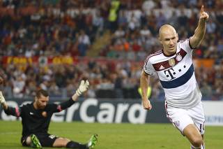 Bayern Munich's Robben celebrates after scoring against AS Roma during their Champions League soccer match at the Olympic stadium in Rome
