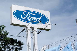 Workers protest at Ford Motor Co's plant in Taubate