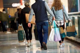 FILE PHOTO: FILE PHOTO: Shoppers at the King of Prussia Mall, United States' largest retail shopping space, in King of Prussia, Pennsylvania, U.S.
