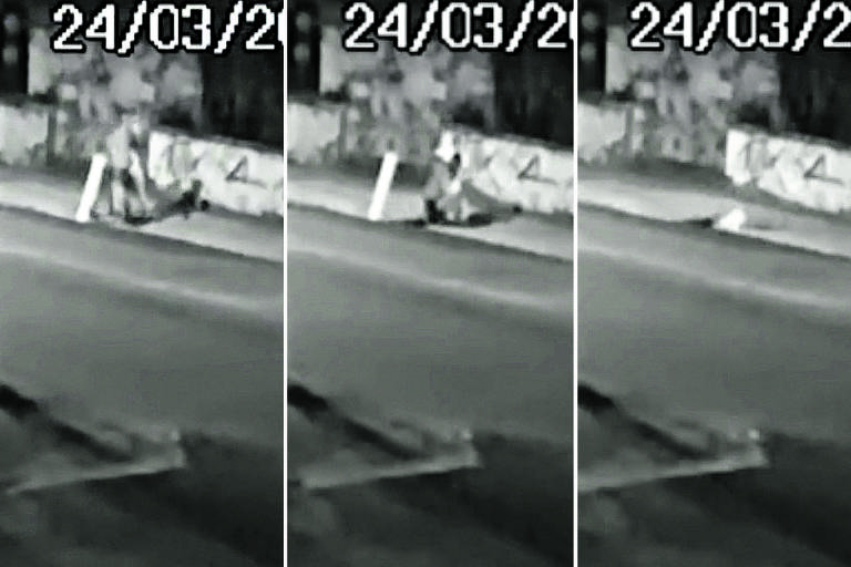 Sequência de imagens de câmera de segurança mostram o momento que dois homens caem dentro de buraco que se abre na calçada