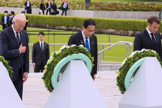 G7 leaders take part in a flower wreath laying ceremony at the Cenotaph for Atomic Bomb Victims in the Peace Memorial Park at the G7 leaders' summit in Hiroshima