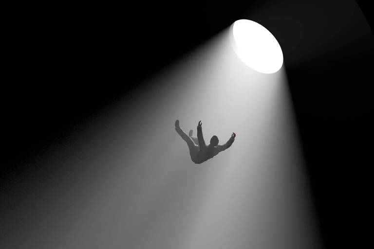 Ilustração mostra homem caindo em um buraco. A cena é toda retratada em preto e banco. No alto, um buraco circular ilumina parte do quadro. Do buraco, cai um homem de costas, com os braços e as pernas ligeiramente levantadas para cima. A queda parece ser bem longa.