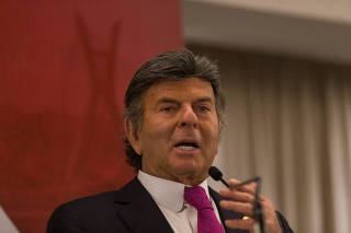 O ministro Luiz Fux, presidente do STF, durante reunião-almoço do Iasp
