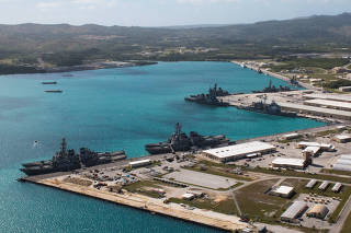 FILE PHOTO: Navy vessels are moored in port at the U.S. Naval Base Guam at Apra Harbor