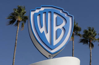 FILE PHOTO: The Warner Bros logo is seen during the annual MIPCOM television programme market in Cannes