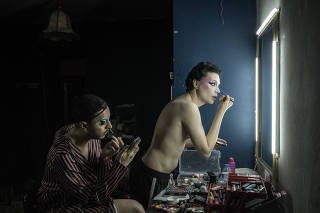 Drag artists applying makeup before a performance in a club in Istanbul, May 20, 2023. (Sergey Ponomarev/The New York Times)